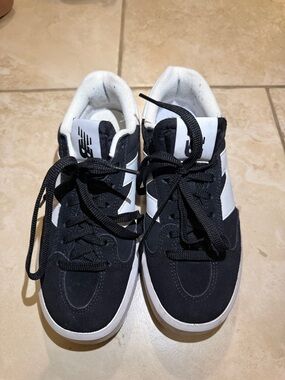 New Balance Black and White Low-Top Sneakers